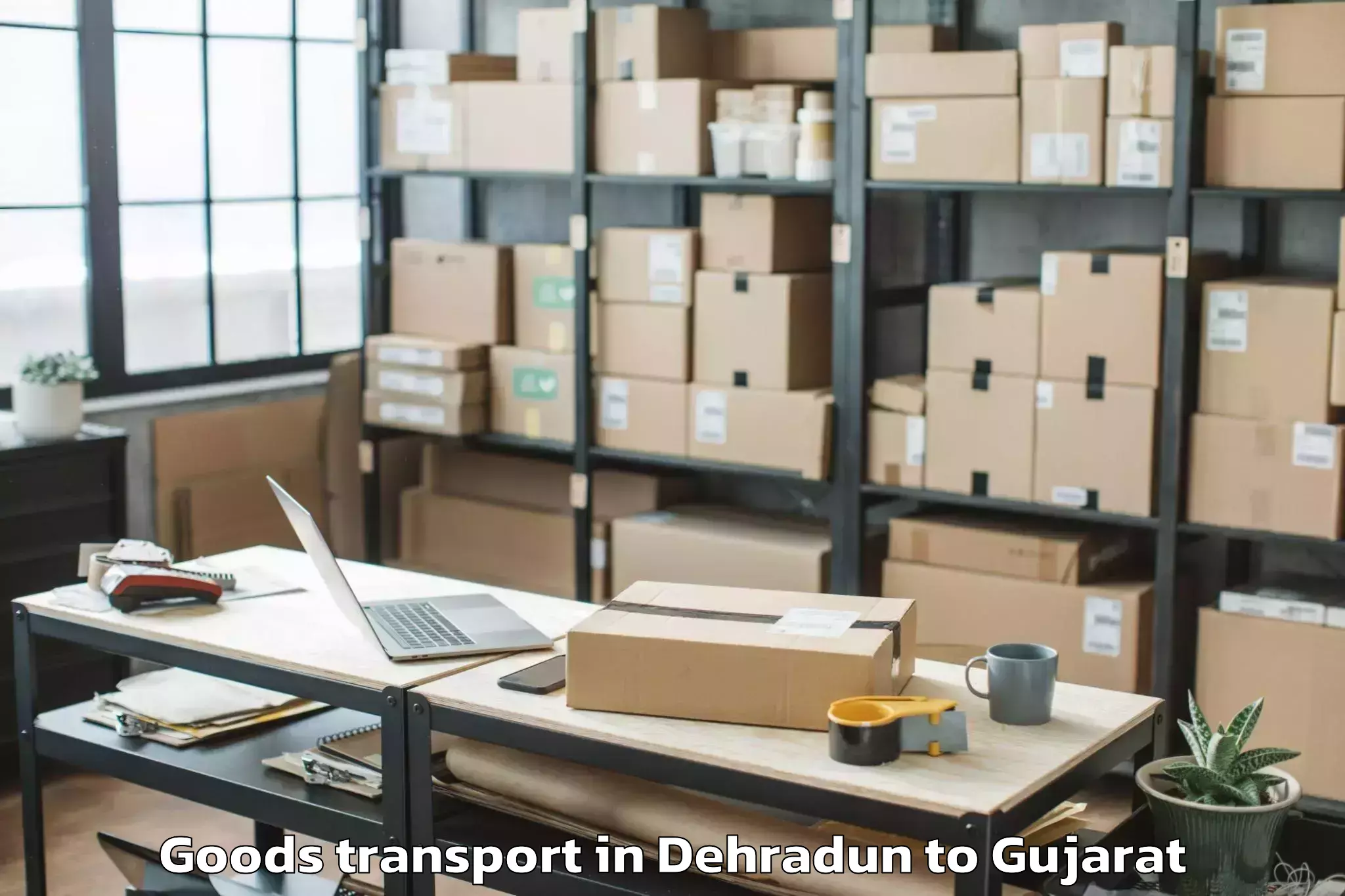 Discover Dehradun to Upleta Goods Transport